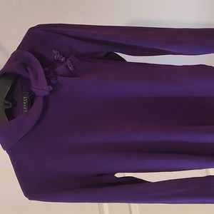 Purple round neck long sleeve top for women. It was lightly used& is perfect.